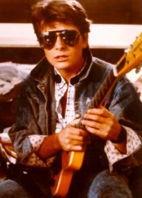 Michael J. Fox from "Back to the Future" with Mark Erlewine's "Chiquita" guitar.